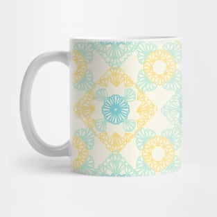 Yellow and blue granny squares over cream Mug